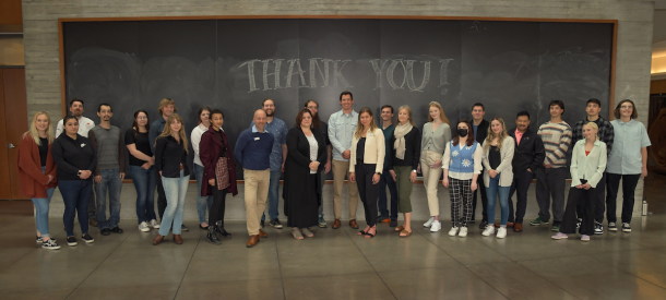 Students in front of chalkboard that says, "Thank You!" in whimsical print.