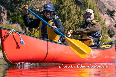 Outdoor leadership student and teacher paddling a canoe