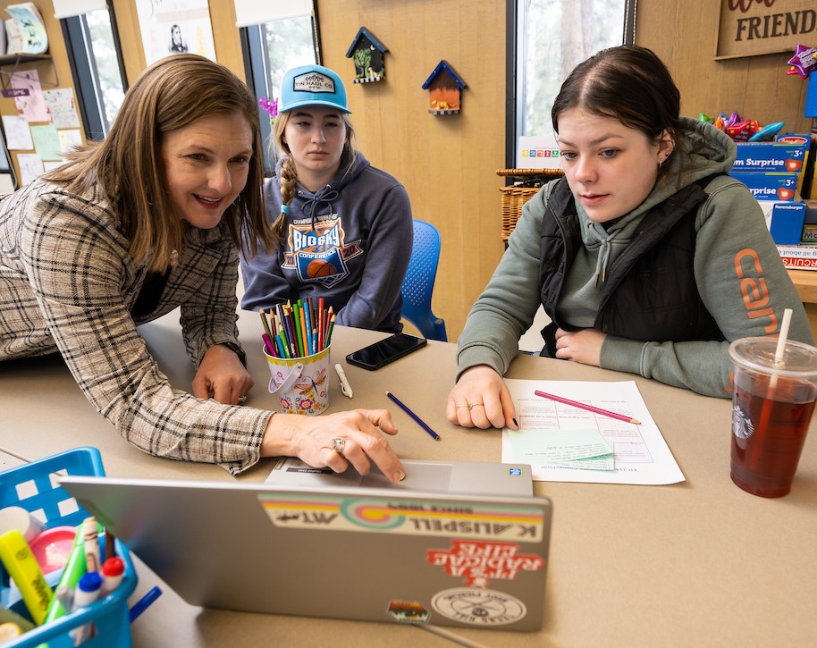 Female instructor with students