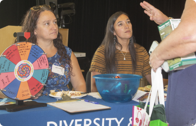 COCC ODI department table at employee all campus kickoff