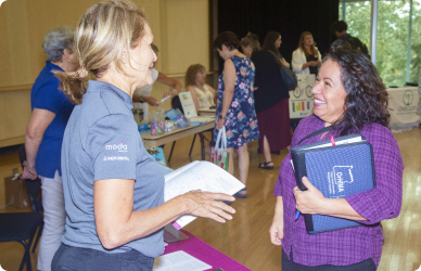 COCC benefits provider going over benefits with staff memeber