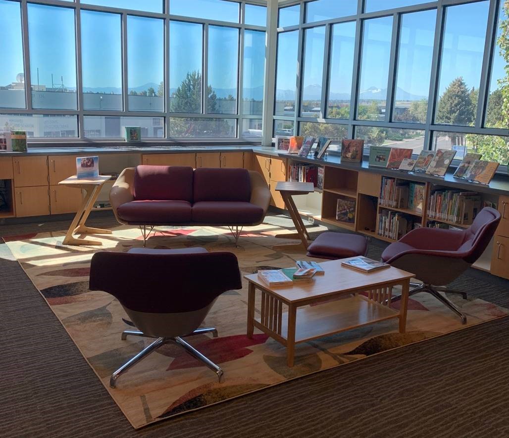 View of mountains as seen through Redmond Commons windows