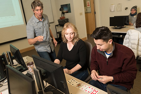 Math professor Sean Rule with students