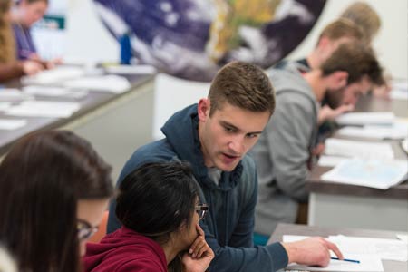 Geographay students learning in classroom