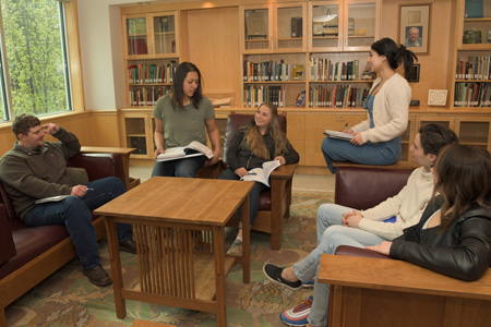 Community college students studying political science together