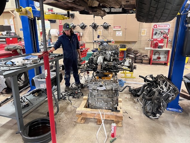 Automotive Tech student swaps out engine.