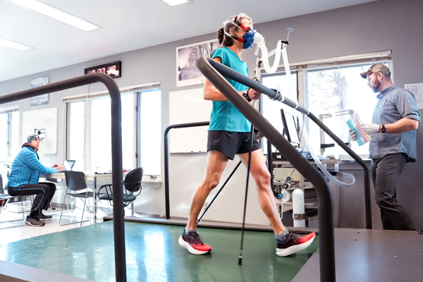 Woman running on treadmill in COCC physiology lab