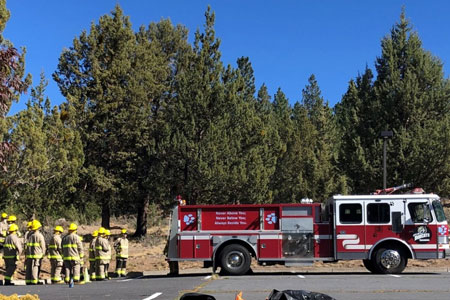 Fire Science community college class meeting behind COCC fire truck