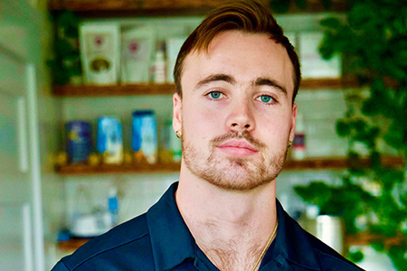 Headshot of COCC student, Brighton. Male with blue eyes and light brown hair.