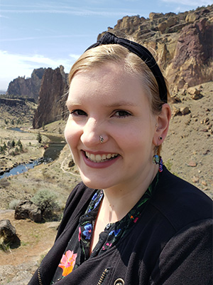 Headshot of COCC massage therapy graduate Sarah.