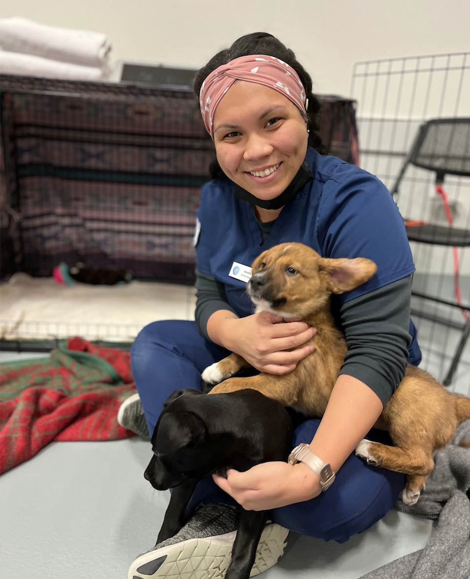 COCC Practicum student with two dogs